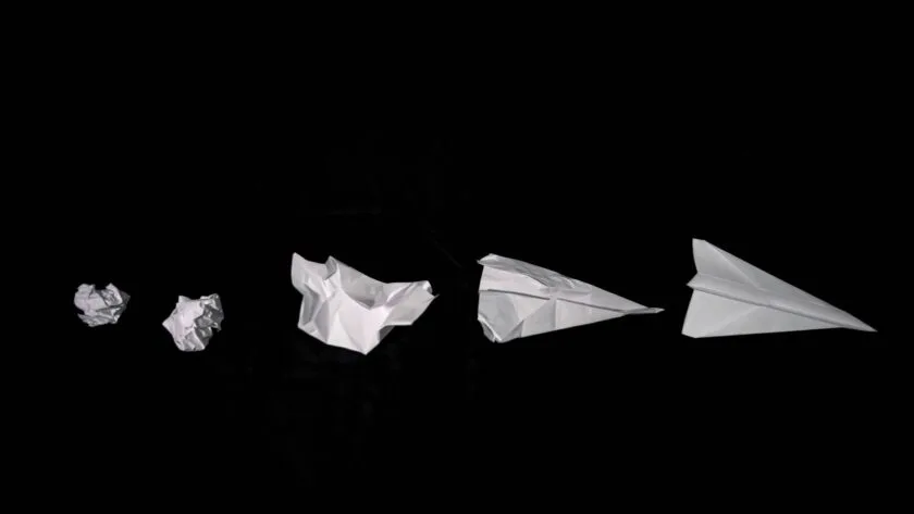 Sequence of crumpled sheets of paper becoming a paper aeroplane, symbolising strategic repositioning